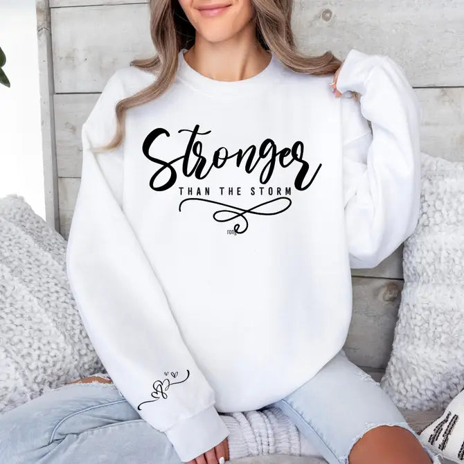 Stronger Than The Storm Graphic Sweatshirt Sweatshirt Tea Shirt Shoppe Small White