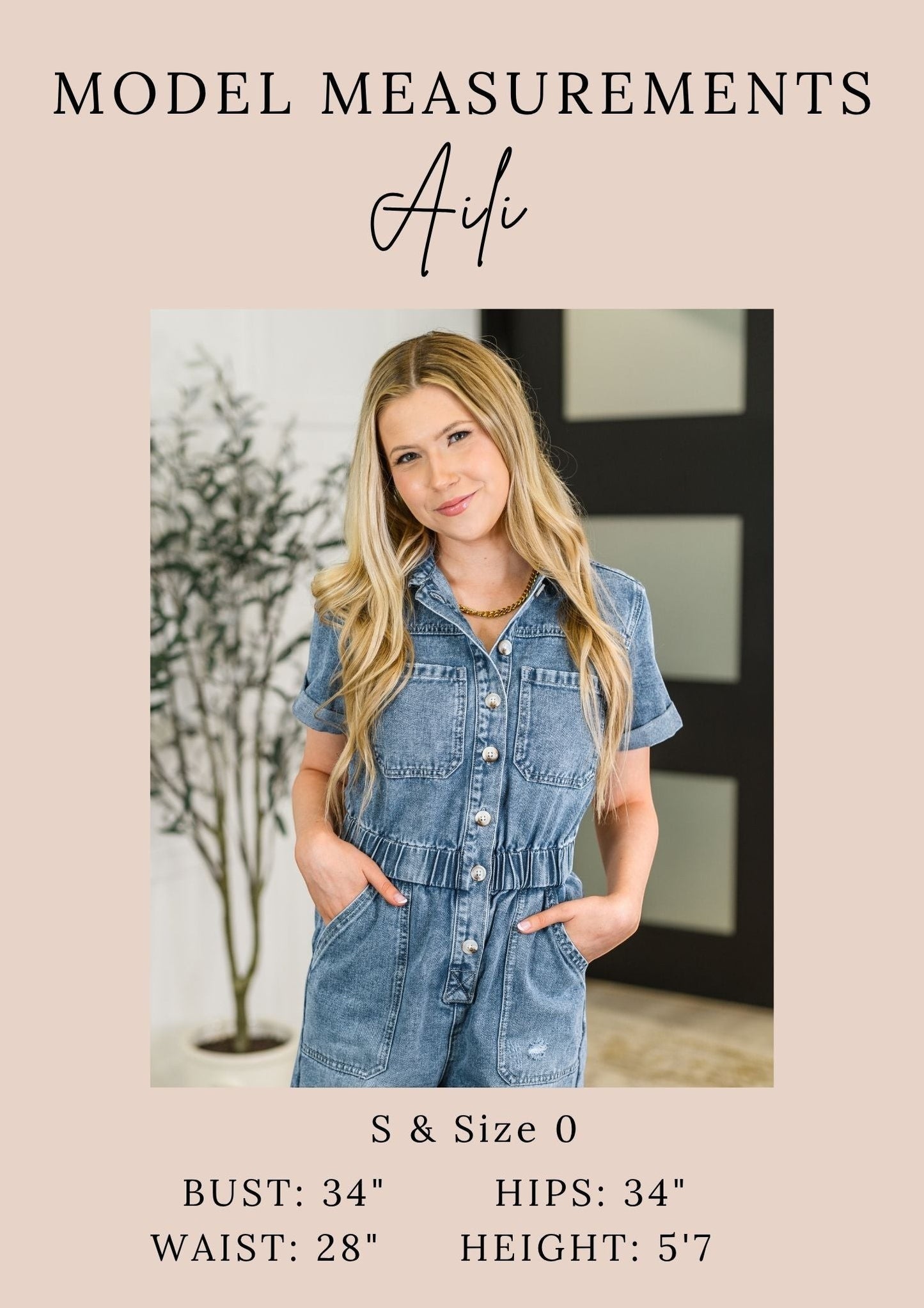 Tea-Shirt Shoppe model Aili wearing a blue denim jumpsuit with button-down front and pockets