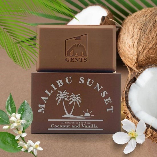 Tea-Shirt Shoppe GENTS Malibu Sunset all-natural 5oz body soap with coconut and vanilla scent, featuring palm trees.