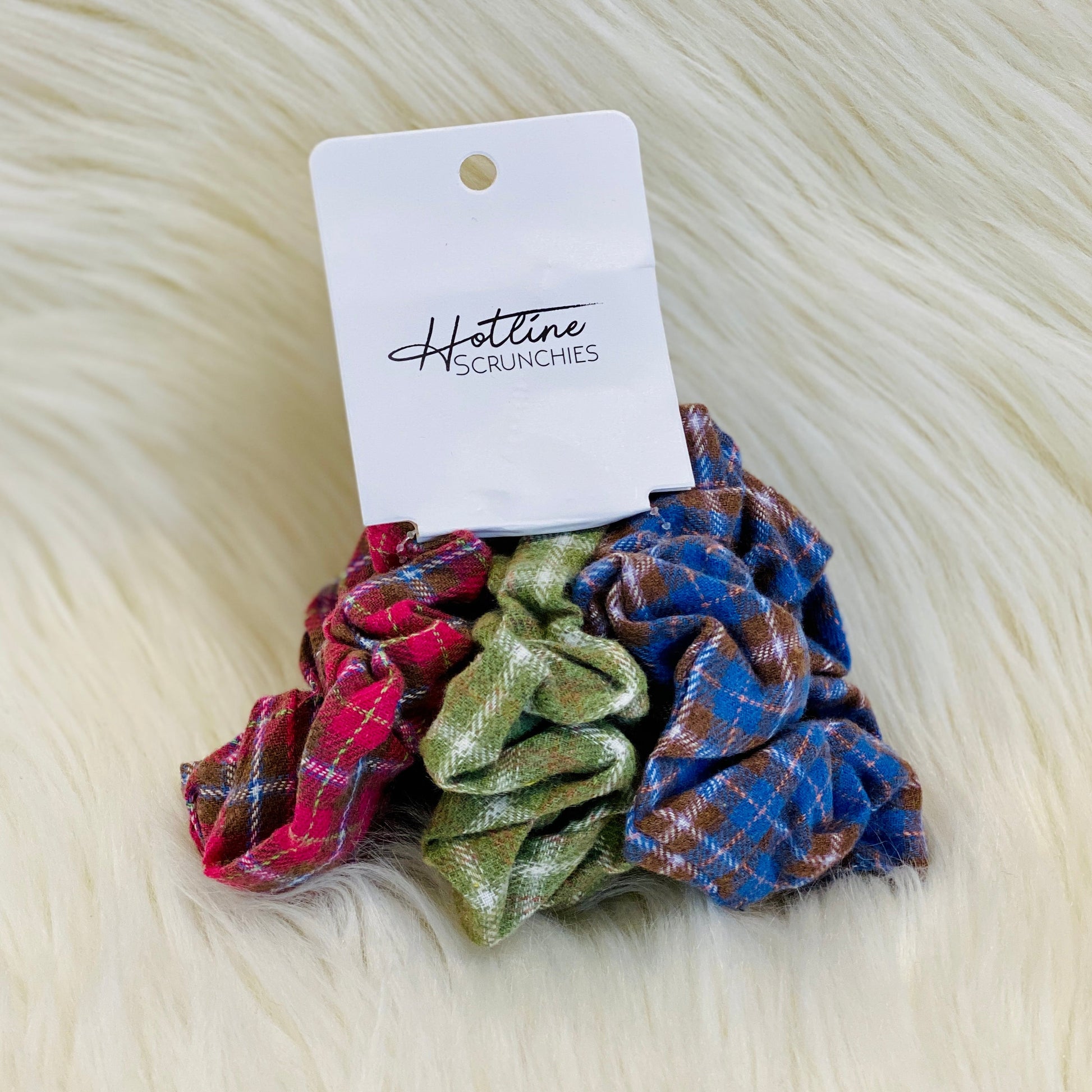 Our Fall Flannel Scrunchie Set has three scrunchies that are different color flannel prints. Perfect to match with your favorite outfit for fall! Also available in our Varsity Flannel Scrunchie Set which has good school spirit flannel print tones.