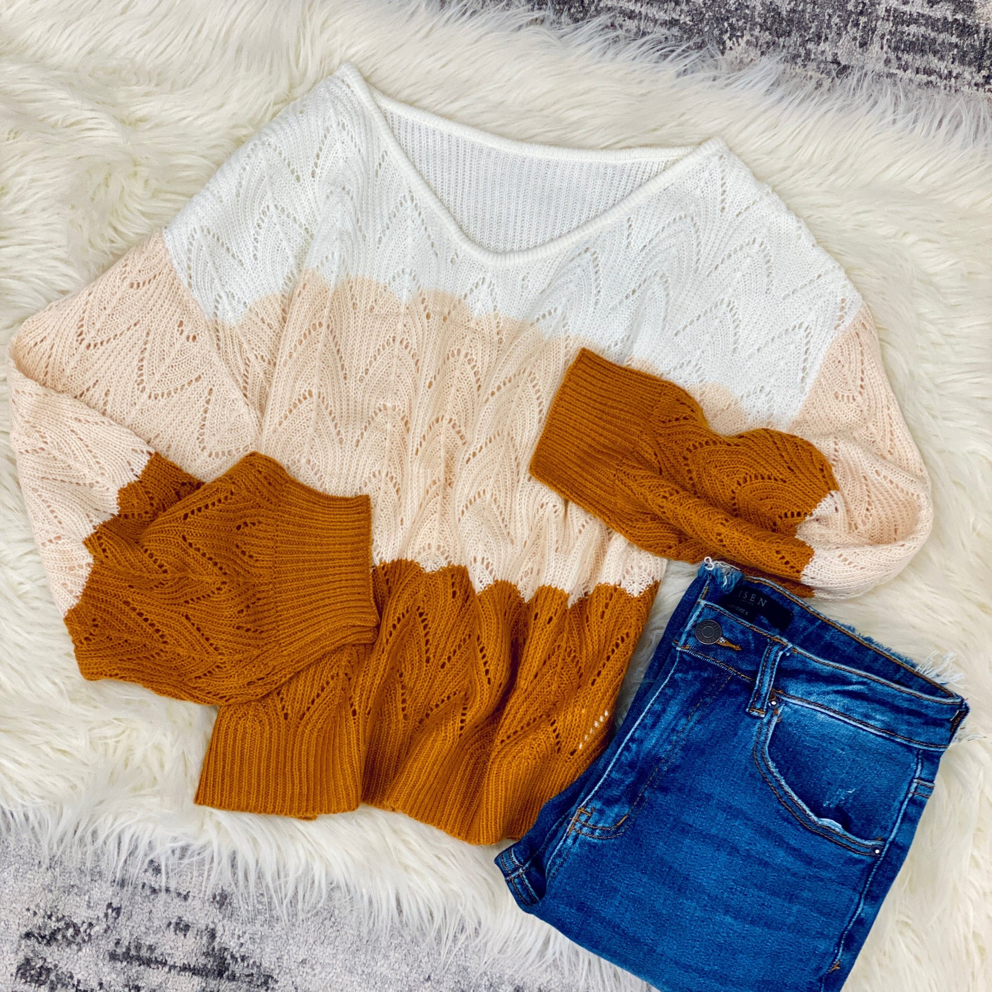 fall knit sweater with blue jeans