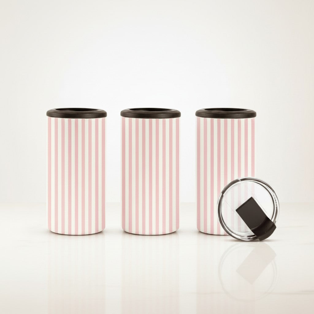 Pink candy stripe 14oz 4-in-1 can cooler tumblers on a wooden picnic table, styled with a soda can, beer bottle, and removable lid.