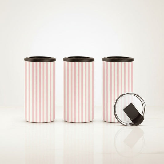 Pink candy stripe 14oz 4-in-1 can cooler tumblers on a wooden picnic table, styled with a soda can, beer bottle, and removable lid.
