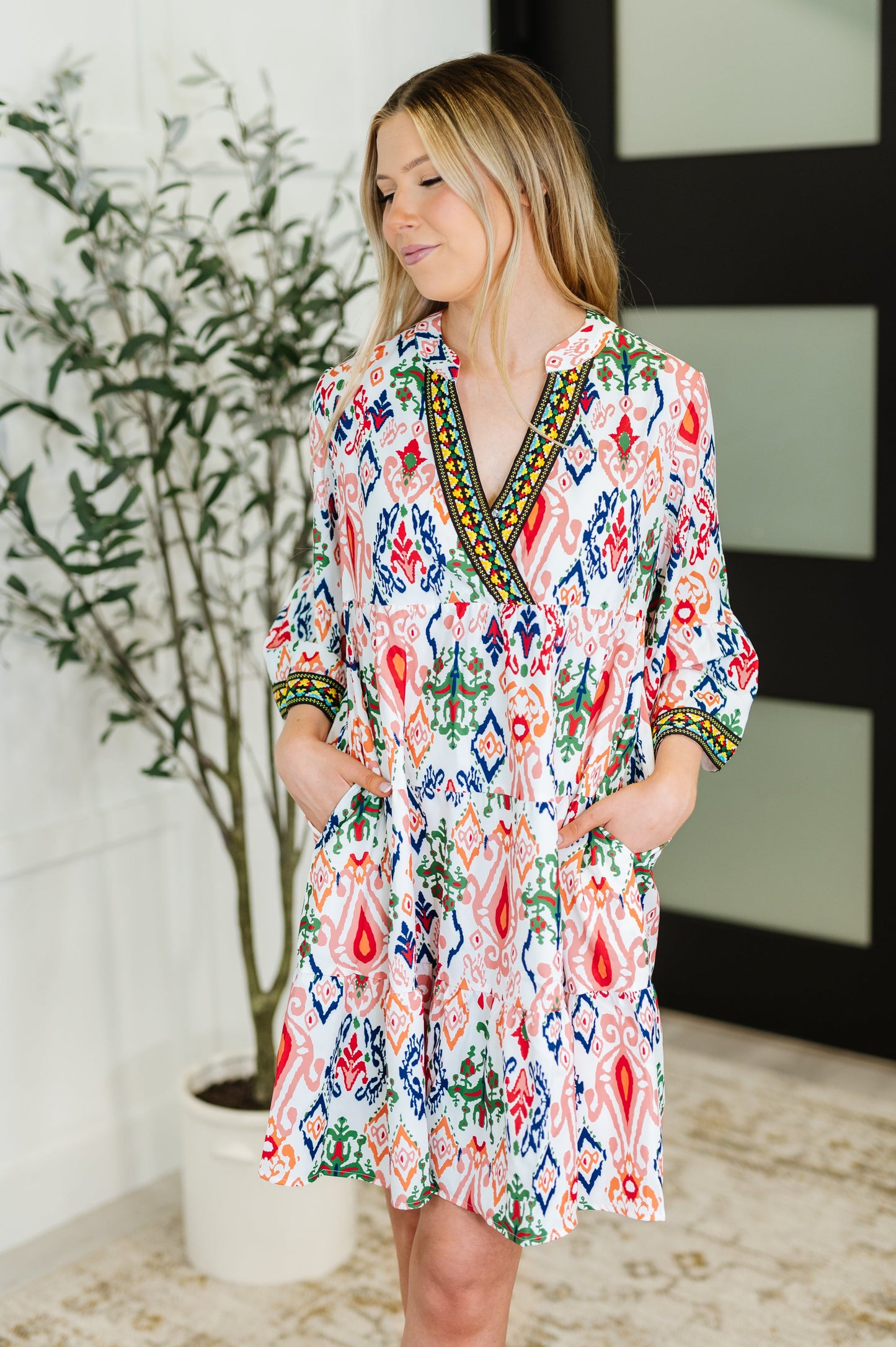 Depend on Me boho tiered dress with criss-cross V-neckline and bell sleeves