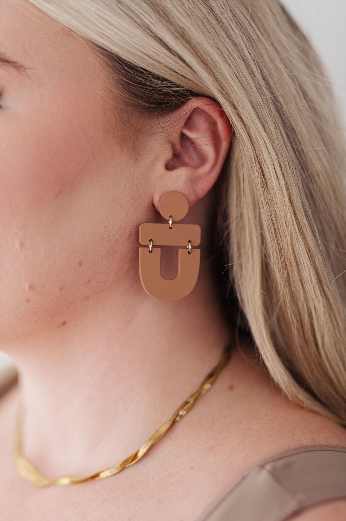 Dreamboat Earrings in Brown, durable plastic