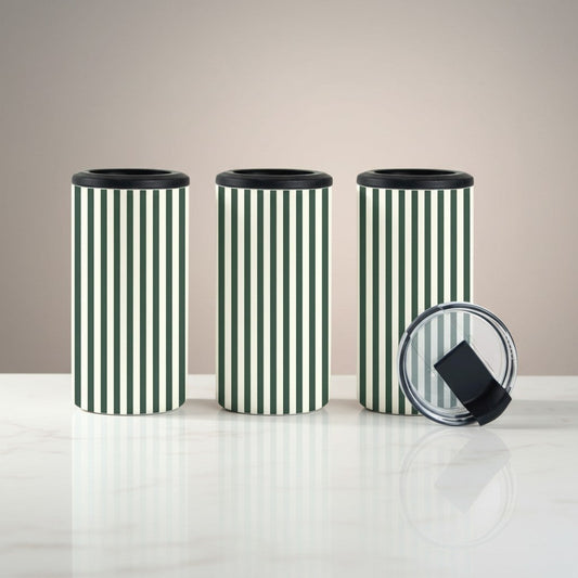 Three striped canisters with black lids on a white surface against a beige background