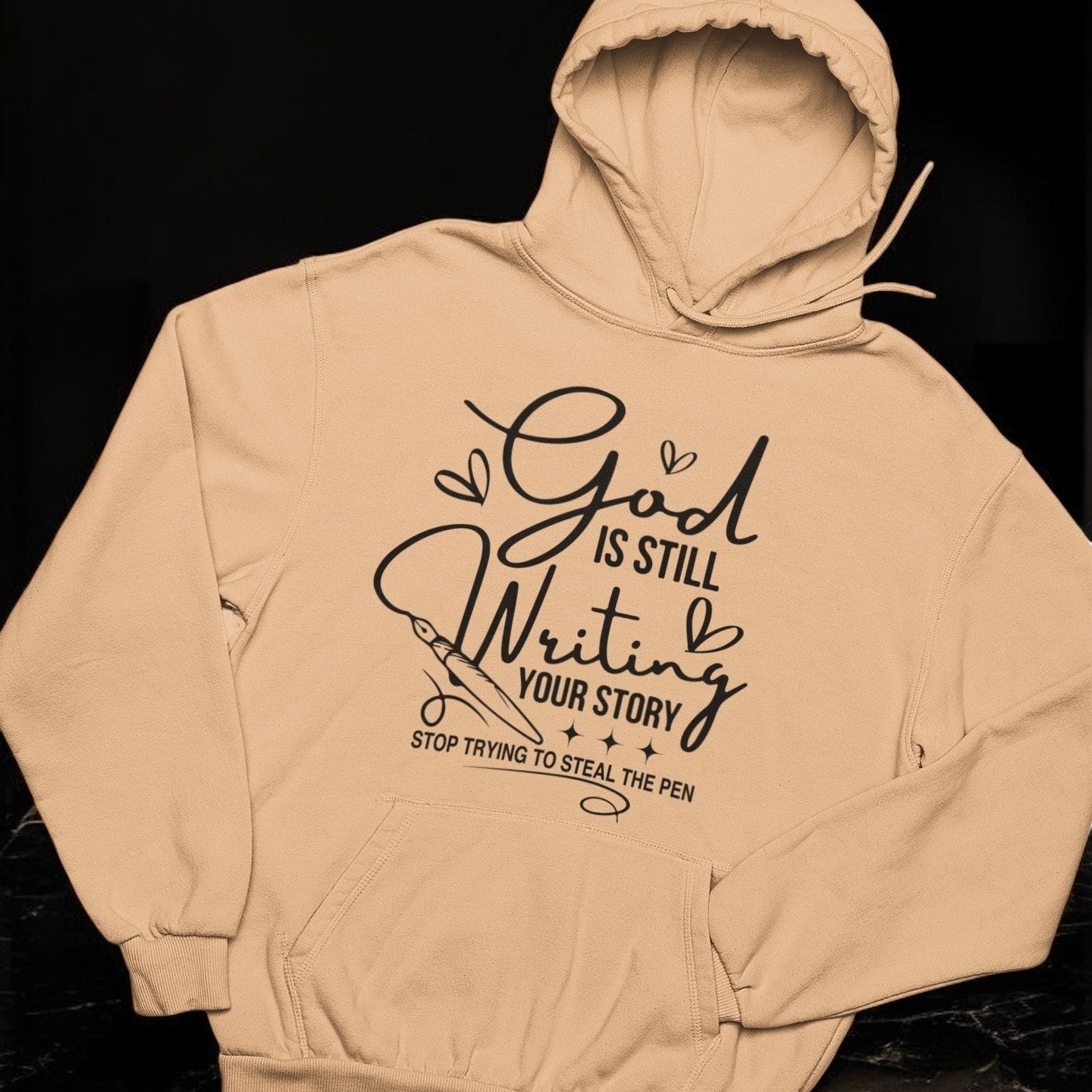 God is Still Writing Graphic Hoodie Sweatshirt Tea Shirt Shoppe XSmall Old Gold