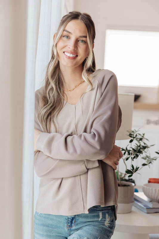 Less Conversation V-Neck Top – textured knit with notched v-neckline and raglan sleeves