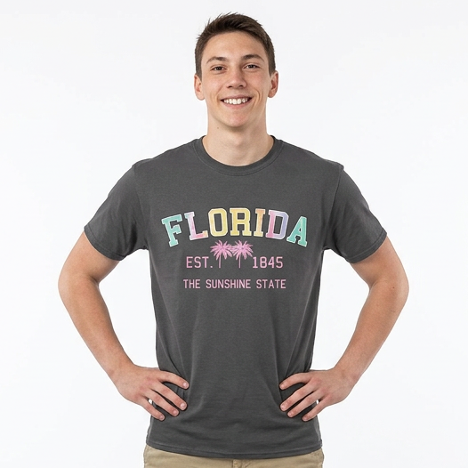 Man wearing a gray 'Florida' t-shirt with text on a white background