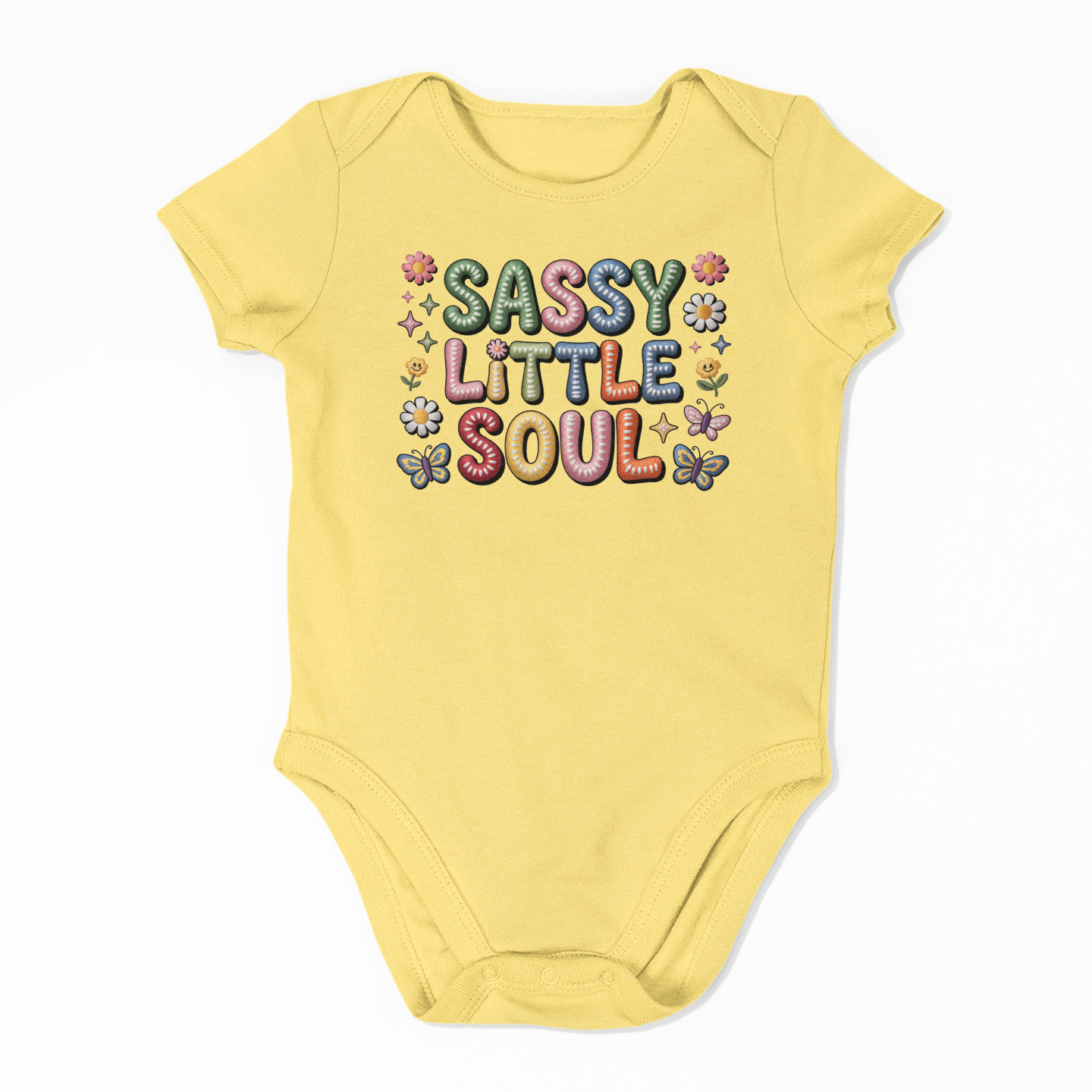 Yellow baby onesie with colorful text and graphics on a white background