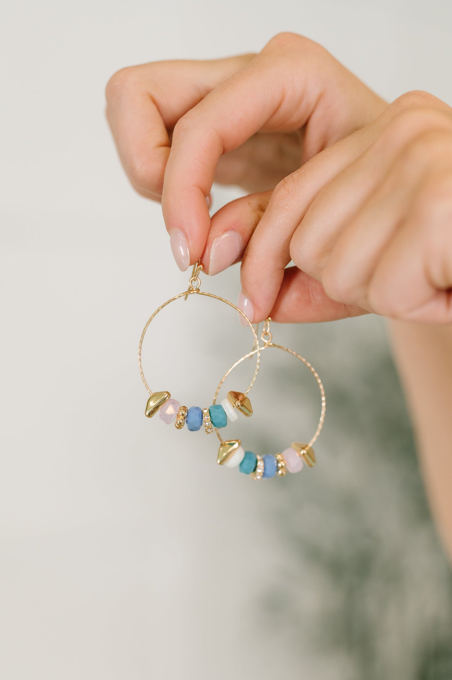Wouldn't Put It Pastel Her hoop earrings with beaded pastel detail
