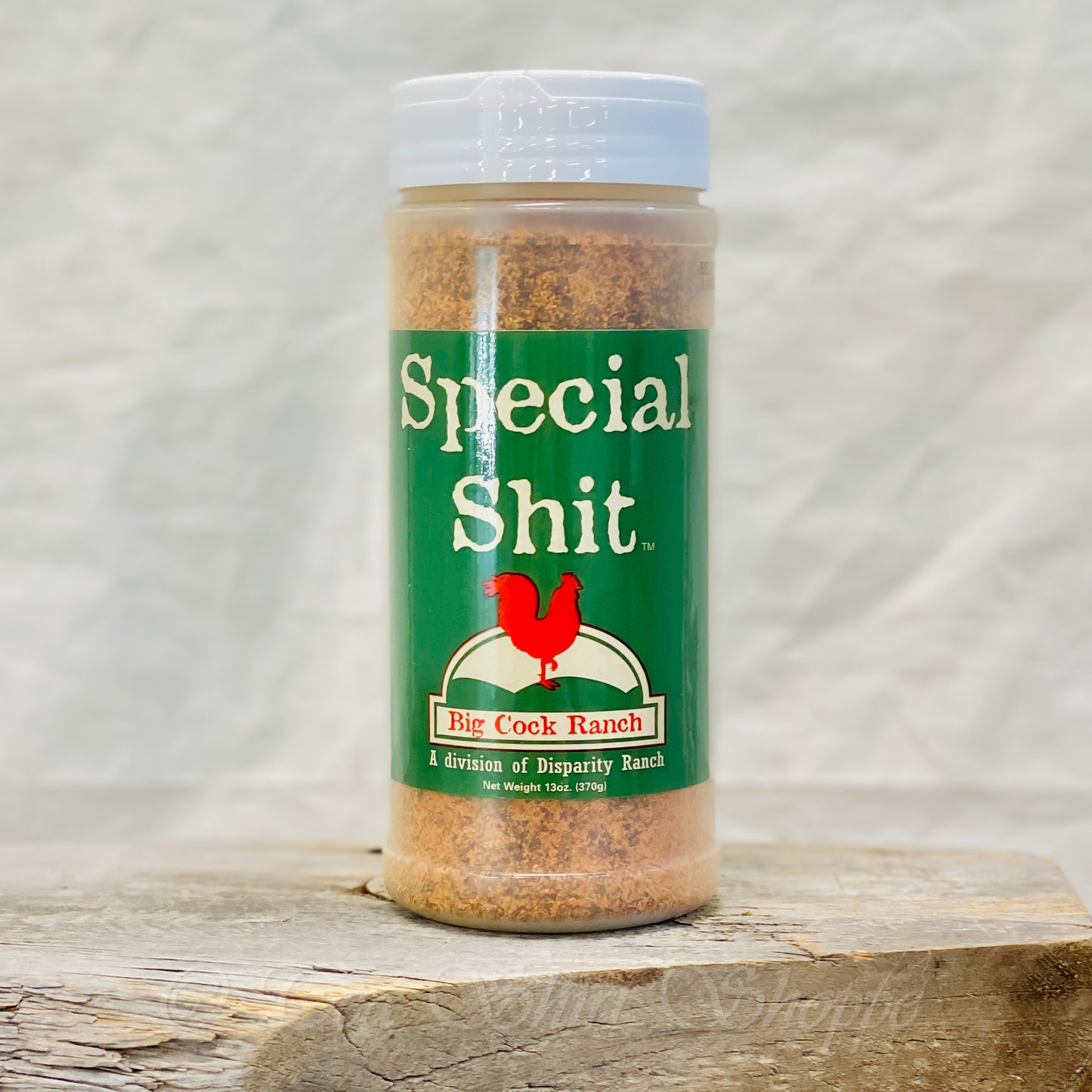 Ingredients:  Salt, Pepper, Granulated Garlic, Paprika, Sugar, Granulated Onion, Chilli Powder, Plain Meat Tenderizer, Calcium Stearate.  Gluten-free, and absolutely NO MSG!  13oz