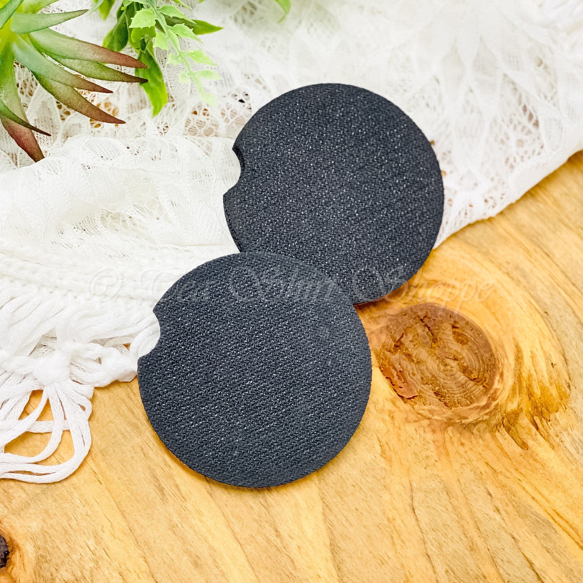 Measuring at just .25 inches in height and 2.5 inches in diameter, these coasters are compact yet highly effective. The absorbent Neoprene material is specially chosen to quickly absorb condensation from your cups, preventing any drips or leaks from reaching your car surfaces.