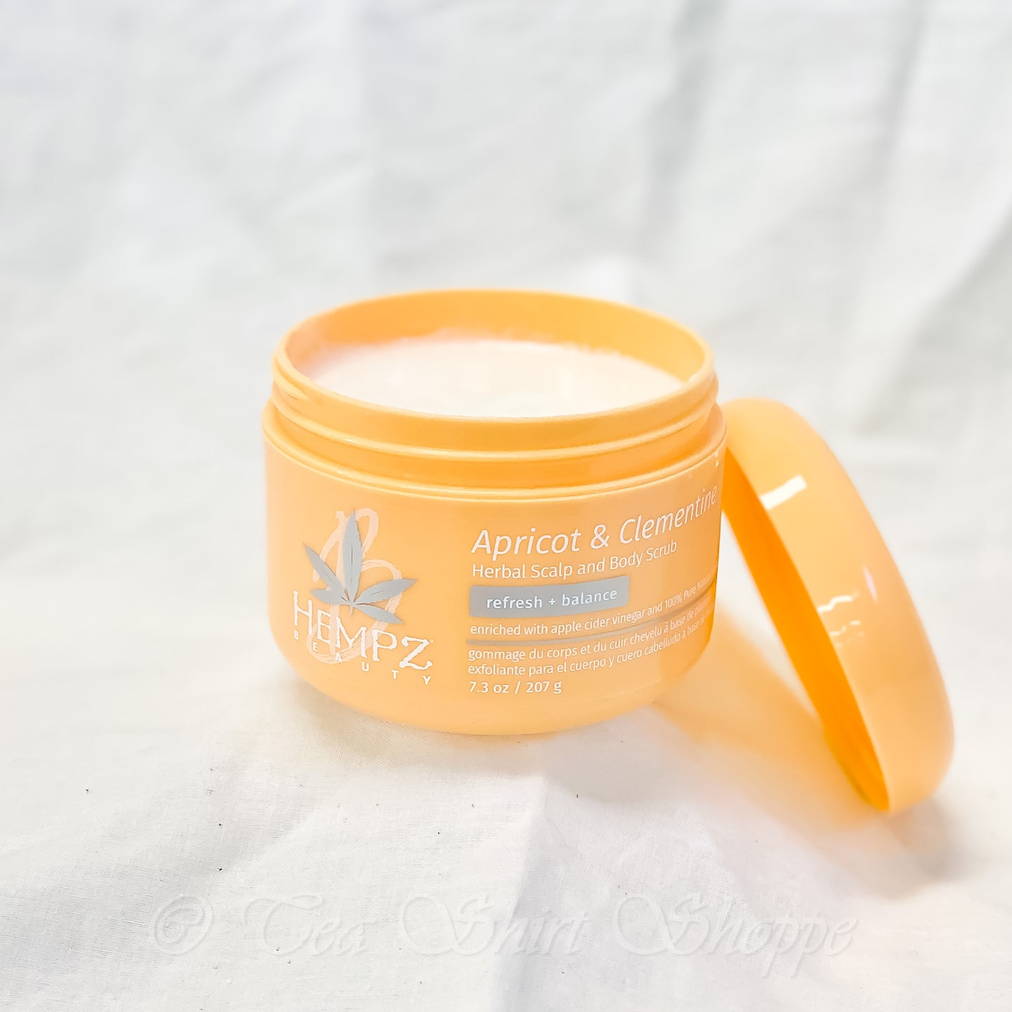 Apricot & Clementine Herbal Scalp & Body Scrub Herbal Scalp & Body Scrub This creamy formula helps remove product build up and impurities from your scalp and body, leaving you feeling conditioned from head-to-toe.