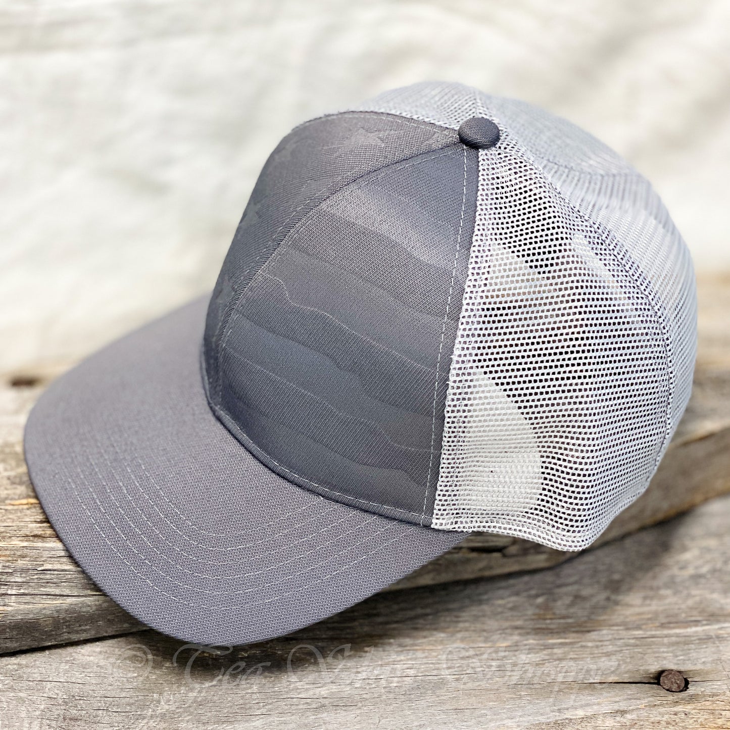 The pre-curved visor of the cap adds an extra layer of style while providing protection from the sun's harmful rays. With its snapback tab closure, the cap offers a secure and comfortable fit, allowing you to wear it all day long without any discomfort.