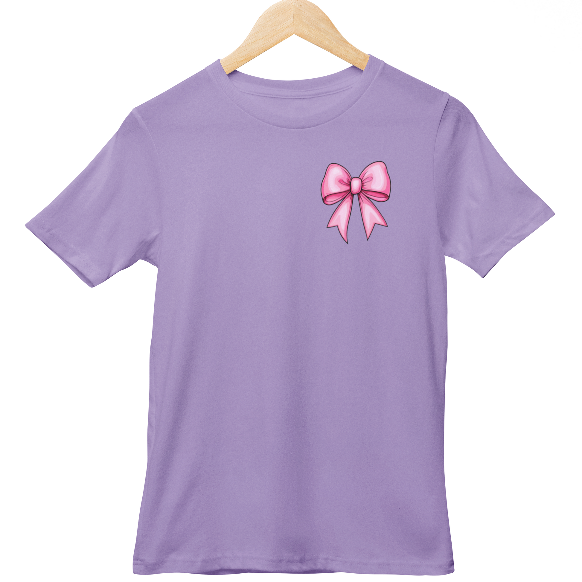 Purple t-shirt with a pink bow design on a hanger against a white background