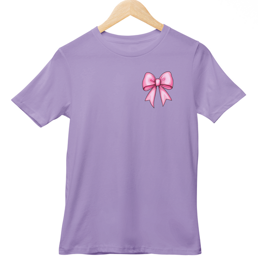 Purple t-shirt with a pink bow design on a hanger against a white background
