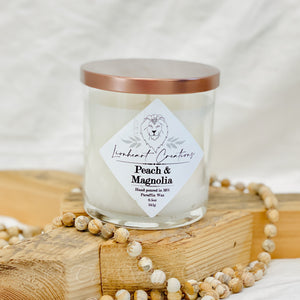 Peach & Magnolia Scented Candle Welcome to the paradise of Peach & Magnolia Scented Candle! Lionheart Creation's candle will fill your home with a sensational treat - the perfect combination of fresh citrus and magnolia. 