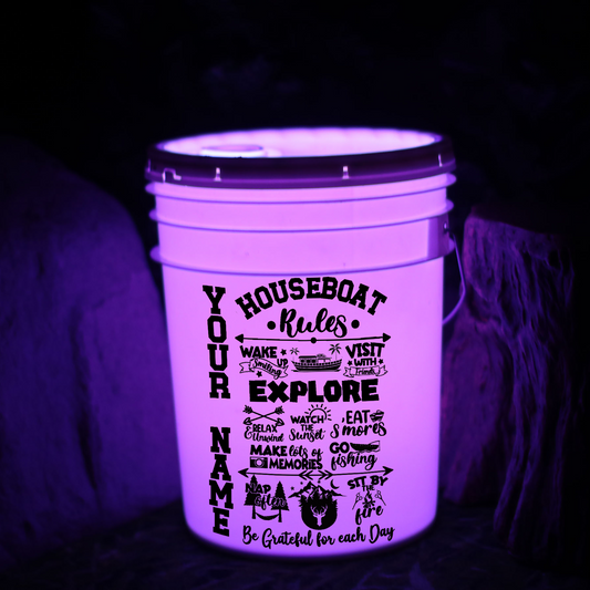 Glowing purple container with engraved text on a dark background