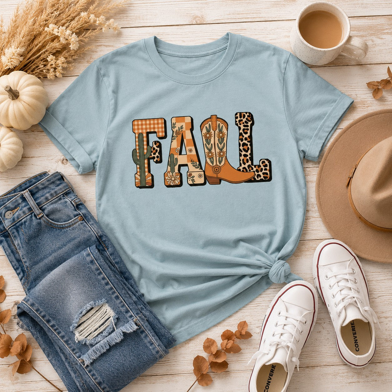 Tea-Shirt Shoppe light blue Comfort Colors 1717 graphic tee featuring a western-themed FALL design with cowboy boots.