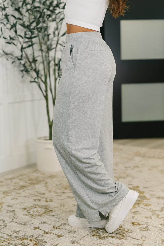 Tea-Shirt Shoppe grey knit wide leg pants with elastic waistband and side pockets worn by a model