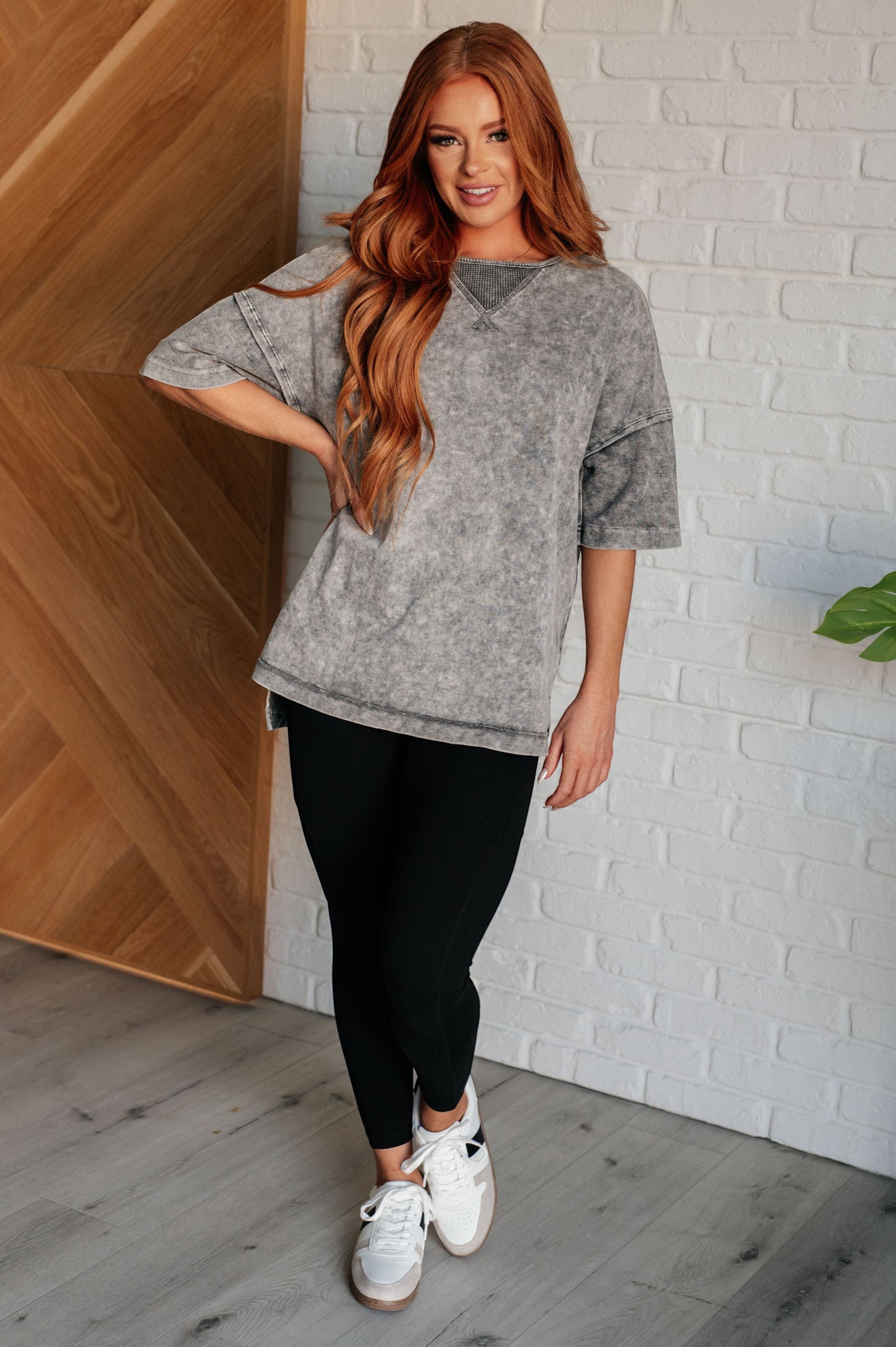 Tea-Shirt Shoppe grey mineral wash top with drop shoulders, raw edges, and waffle knit detail worn by a model