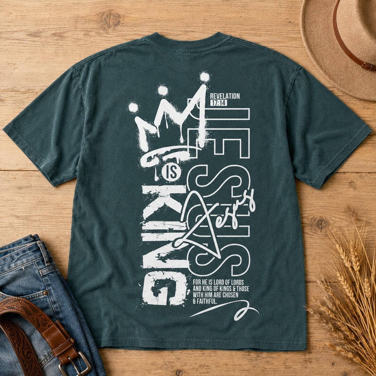 Tea-Shirt Shoppe dark green unisex graphic tee featuring a white Jesus Is King crown design on the back