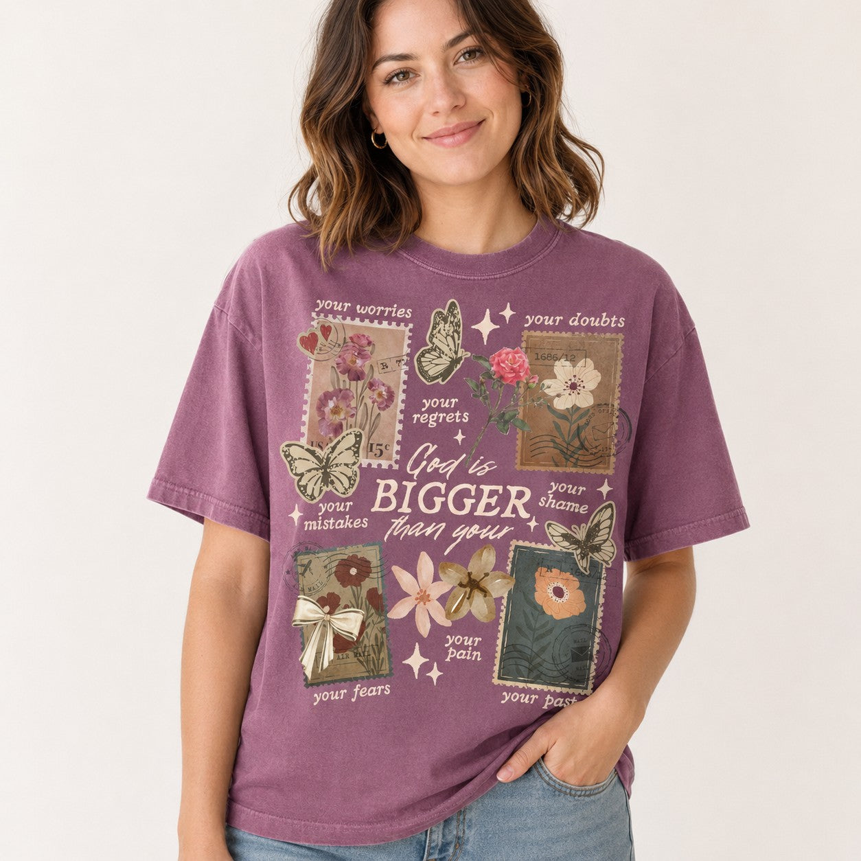 Tea-Shirt Shoppe vintage-style purple cotton graphic tee with floral and butterfly illustrations and faith message.