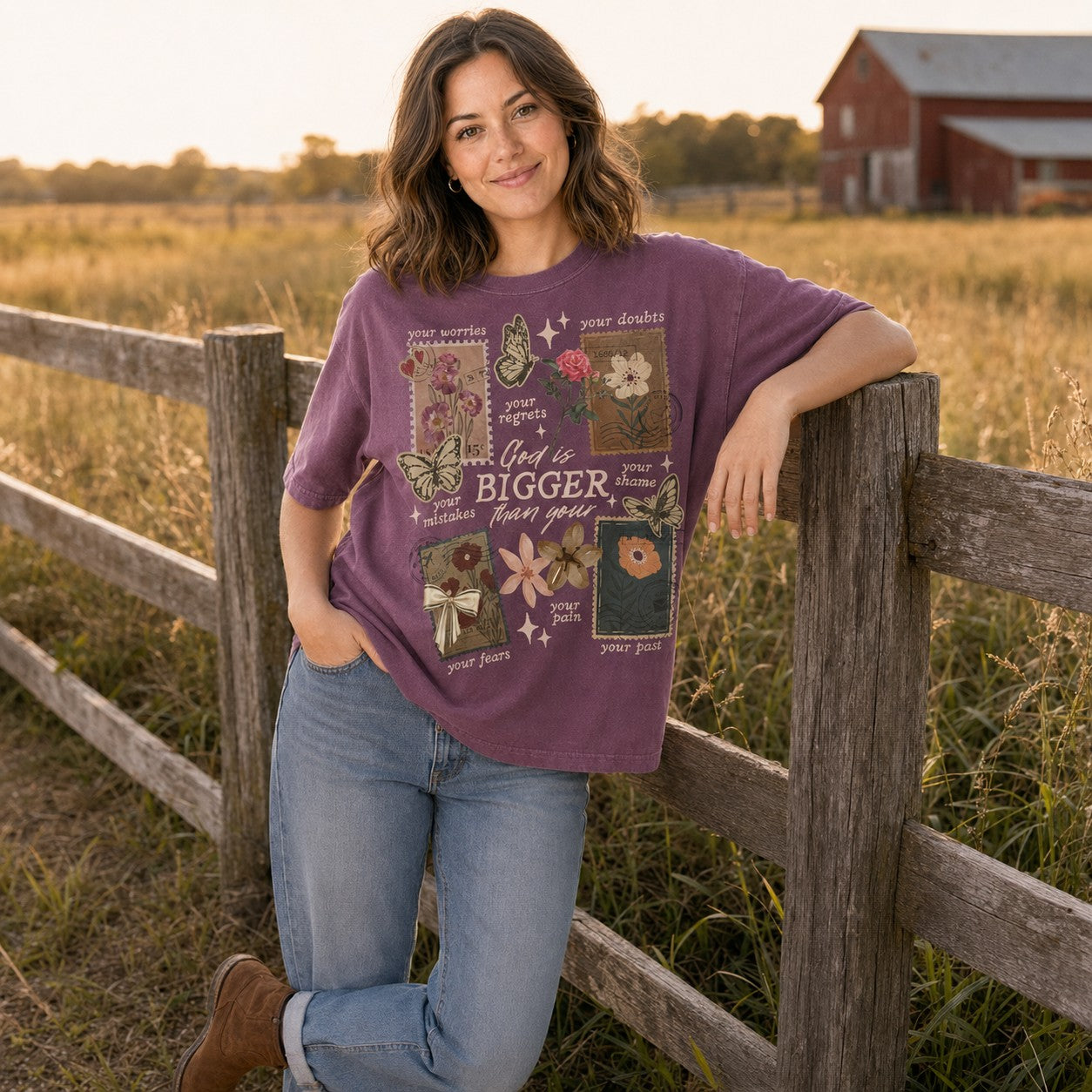 Woman wearing a Tea-Shirt Shoppe muted purple cotton graphic tee with floral and butterfly designs in a field.