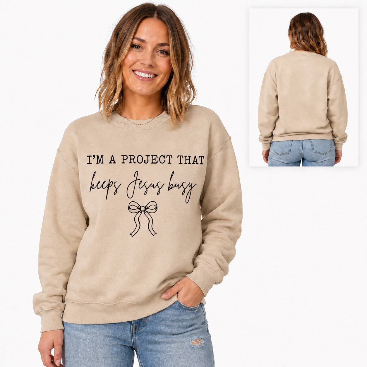 Tea-Shirt Shoppe sand crewneck sweatshirt with I'm a Project That Keeps Jesus Busy text and bow graphic on a model