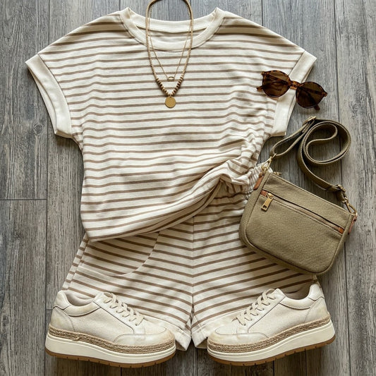 Tea-Shirt Shoppe striped short sleeve top and shorts lounge set in beige and brown. Includes necklace, sunglasses, and crossbody bag.