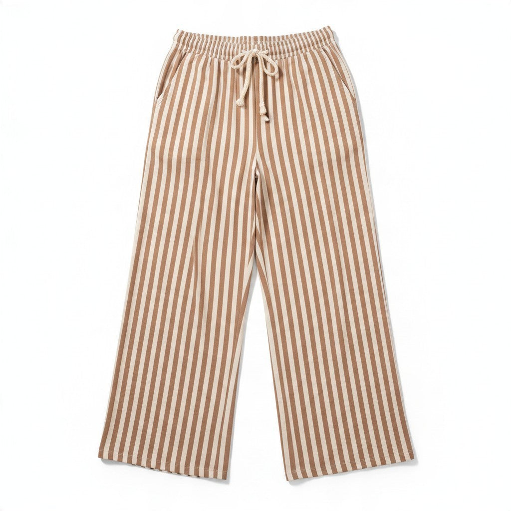 Tea-Shirt Shoppe oversized wide leg pants featuring a beige and white vertical stripe pattern and drawstring waist.