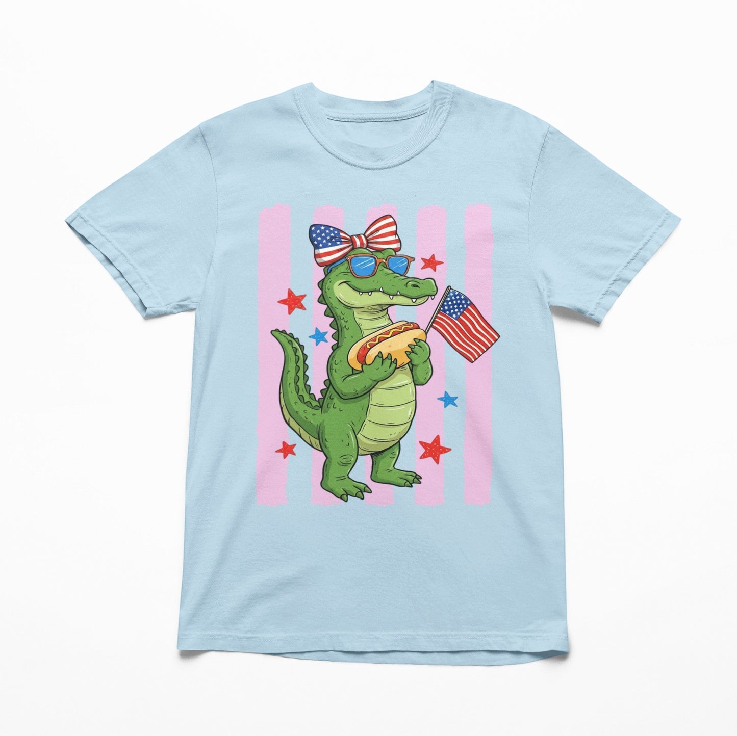 Tea Shirt Shoppe Wholesale light blue 100% cotton youth graphic tee with a cartoon alligator holding a hot dog and an American flag.