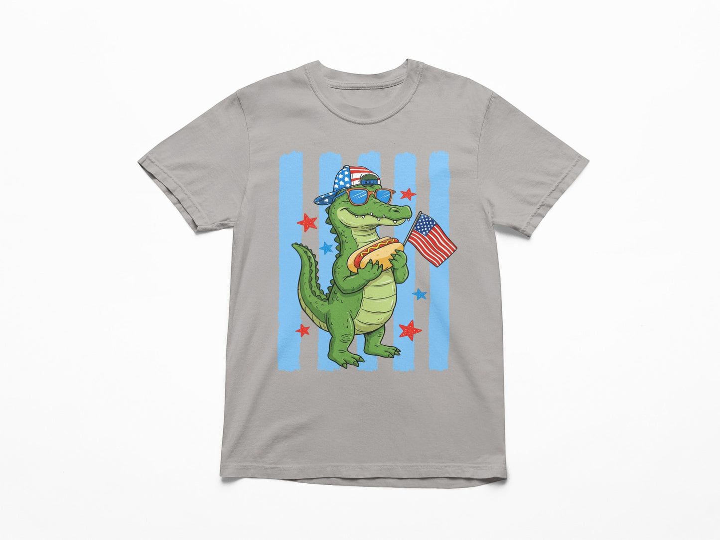 Tea Shirt Shoppe Wholesale grey 100% cotton youth graphic tee with a cartoon alligator wearing sunglasses and a flag hat, holding a hot dog and an American flag.