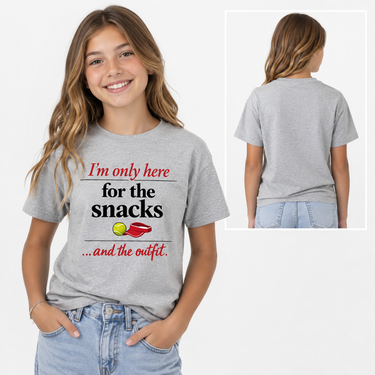 Tea Shirt Shoppe Wholesale grey tennis graphic tee with Here For The Snacks text worn by a smiling girl
