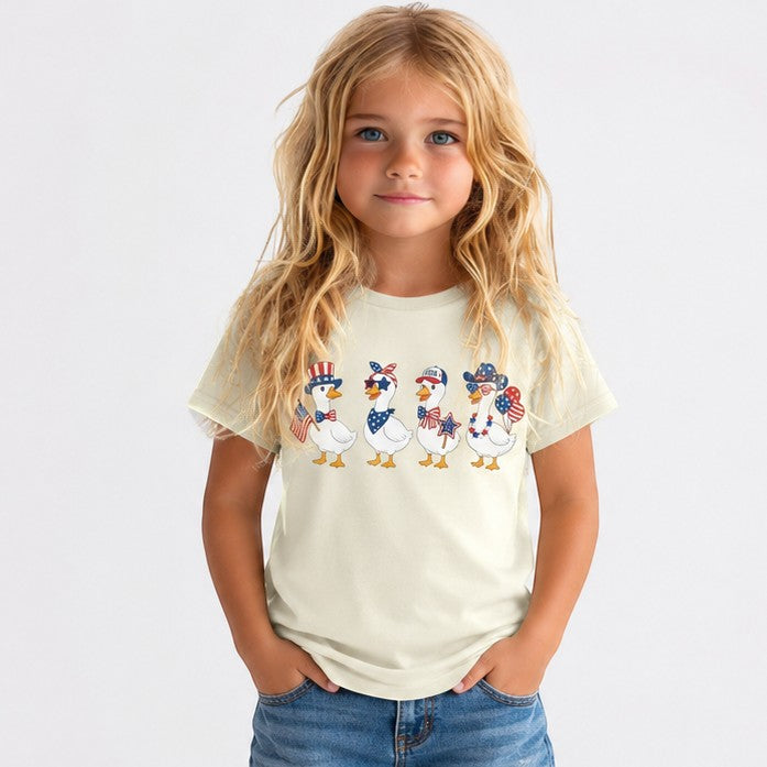 Tea Shirt Shoppe Wholesale cream graphic tee with four patriotic geese wearing hats and bandanas.