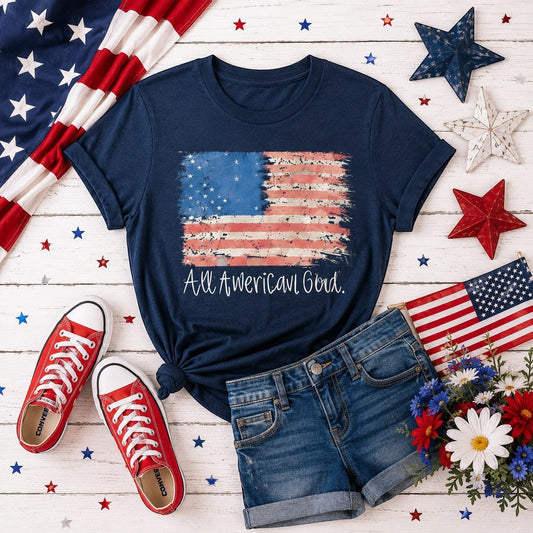 Navy blue cotton graphic tee with distressed American flag and "All American Girl" text. Tea Shirt Shoppe Wholesale.