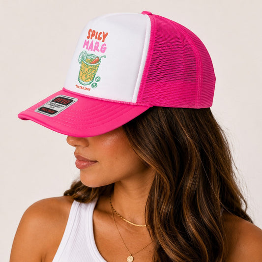 Tea Shirt Shoppe Wholesale Spicey Marg trucker hat with white front panel and hot pink mesh back. Features a graphic of a margarita.