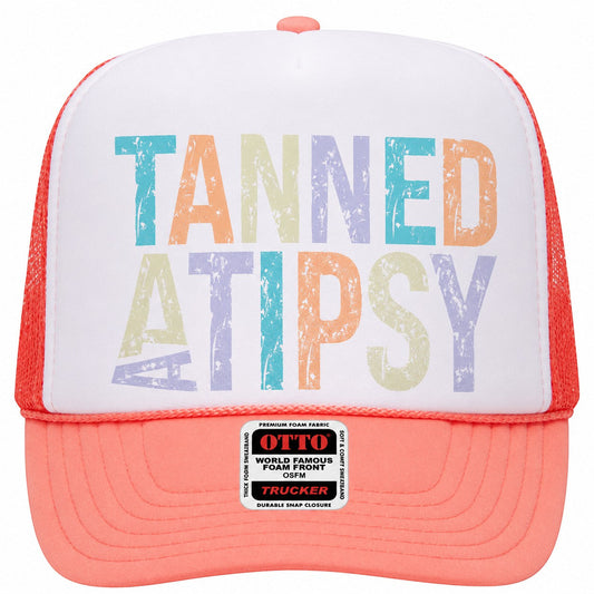 Tea Shirt Shoppe Wholesale Tanned And Tipsy trucker hat with white foam front, coral mesh back, and colorful text.