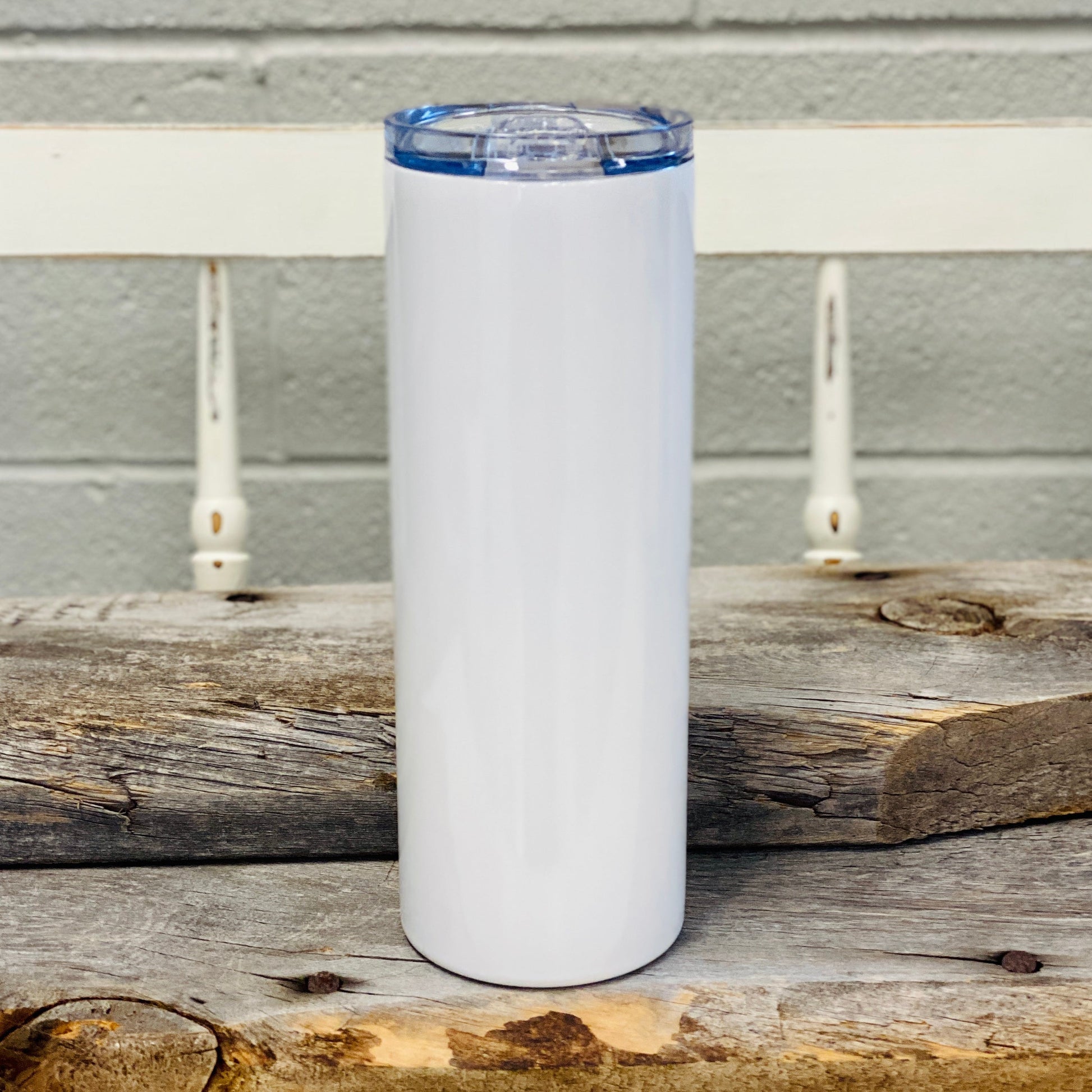20oz, White Luma Steel™ Stainless Steel Skinny Tumbler, with clear lid and metal straw. 8" x 2 7/8" dia. This popular tumbler design is great for both men and women. Available in white.