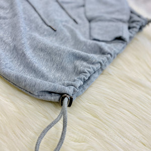 Crafted from soft cotton French terry fabric and featuring an half zip closure, slightly cropped fit, drawstring hem, and a chic flattering silhouette. This pullover is truly the ideal piece of activewear that's perfect for your daily routine! 