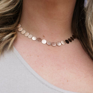 Color: Rose Gold Choker Detail Brushed Metal Detail Circle Charm Detail 13" Chain Length 3" Extender Length Composition: Iron Brass
