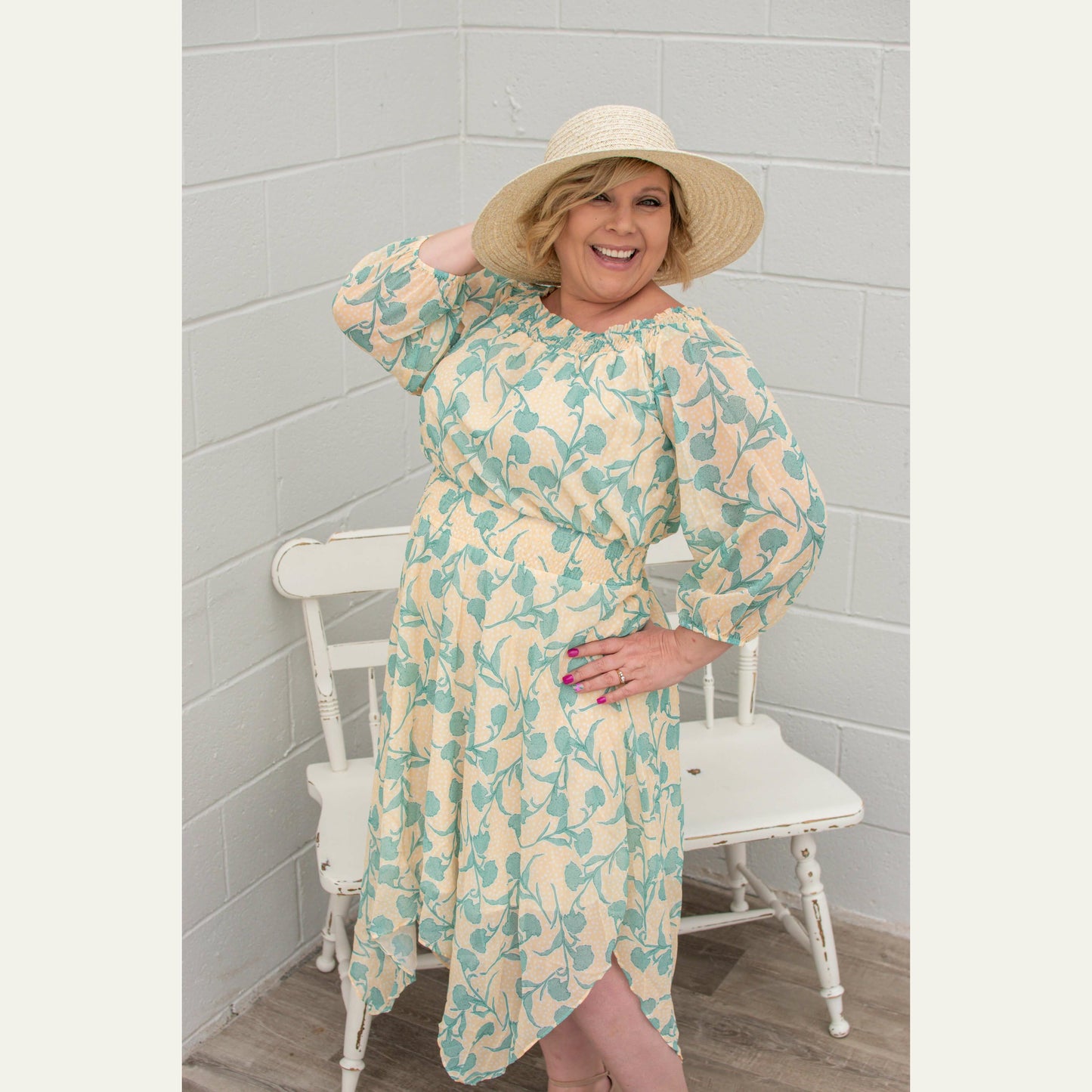 This Kori America handkerchief hem dress is perfect for spring and summer it features an empire elastic waist. and 3/4 sleeves. I love how flowy it is. And it's fully lined so no need for a slip.  100% Polyester fully lined