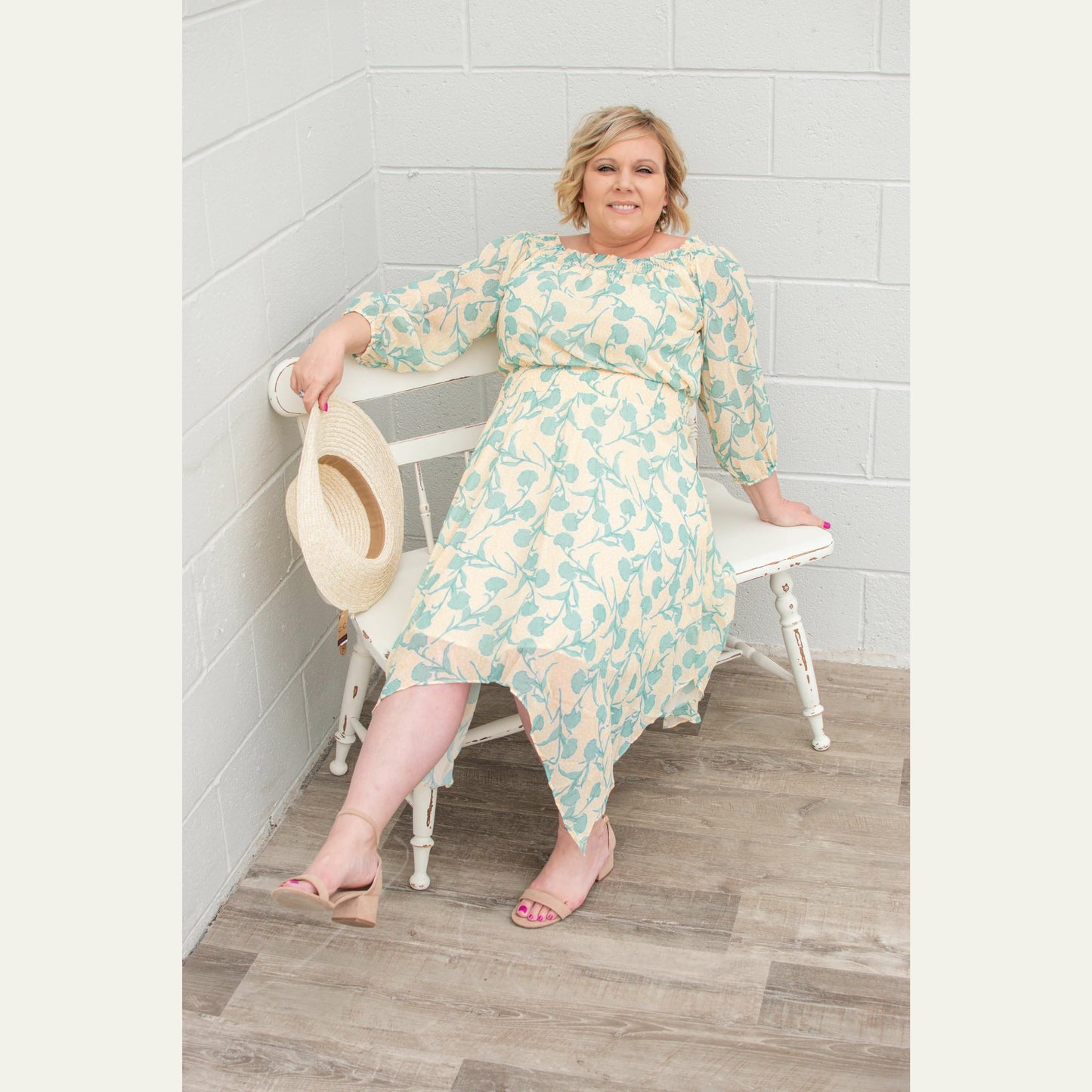 This Kori America handkerchief hem dress is perfect for spring and summer it features an empire elastic waist. and 3/4 sleeves. I love how flowy it is. And it's fully lined so no need for a slip.  100% Polyester fully lined