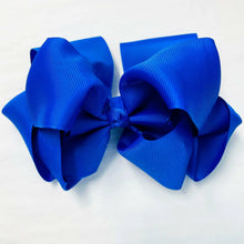 Blue grosgrain bow.
