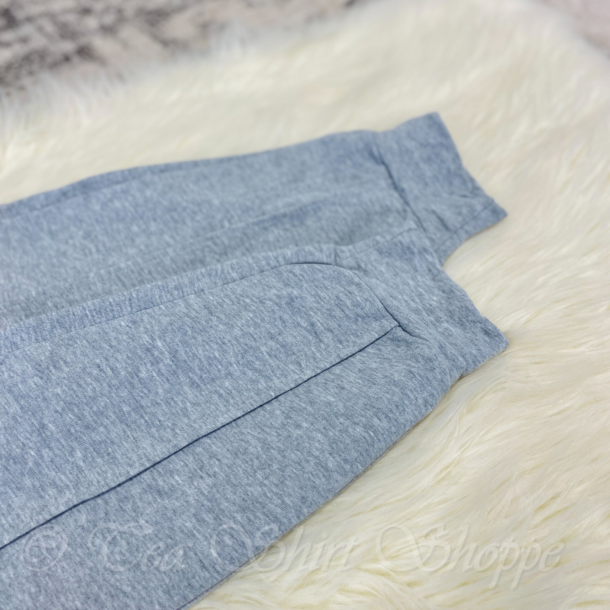 Crafted with the utmost care from soft, premium fabrics, these bottoms are sure to be your go-to for days spent relaxing at home. And why not pair them with our matching Heather Grey Terry Top? 