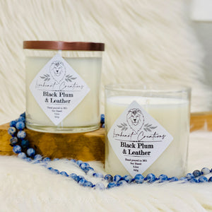 Black Plum & Leather Soy Based Candle  Start your day with a burst of freshness with Lionheart Creation's hand poured Black Plum & Leather candle. Enjoy the uplifting fragrance as you get ready for your day.  Soy based Glass jar Suction seal lid 8.5 ounces