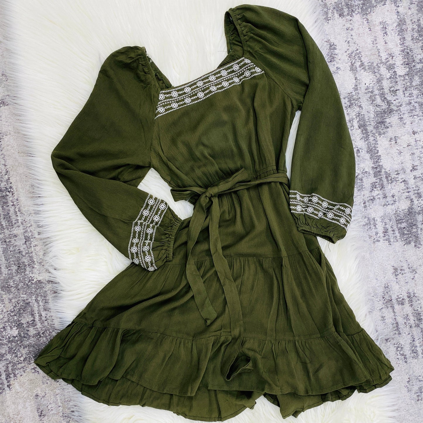  Pair it with leggings and cute boots for a complete look that will have you feeling your best.