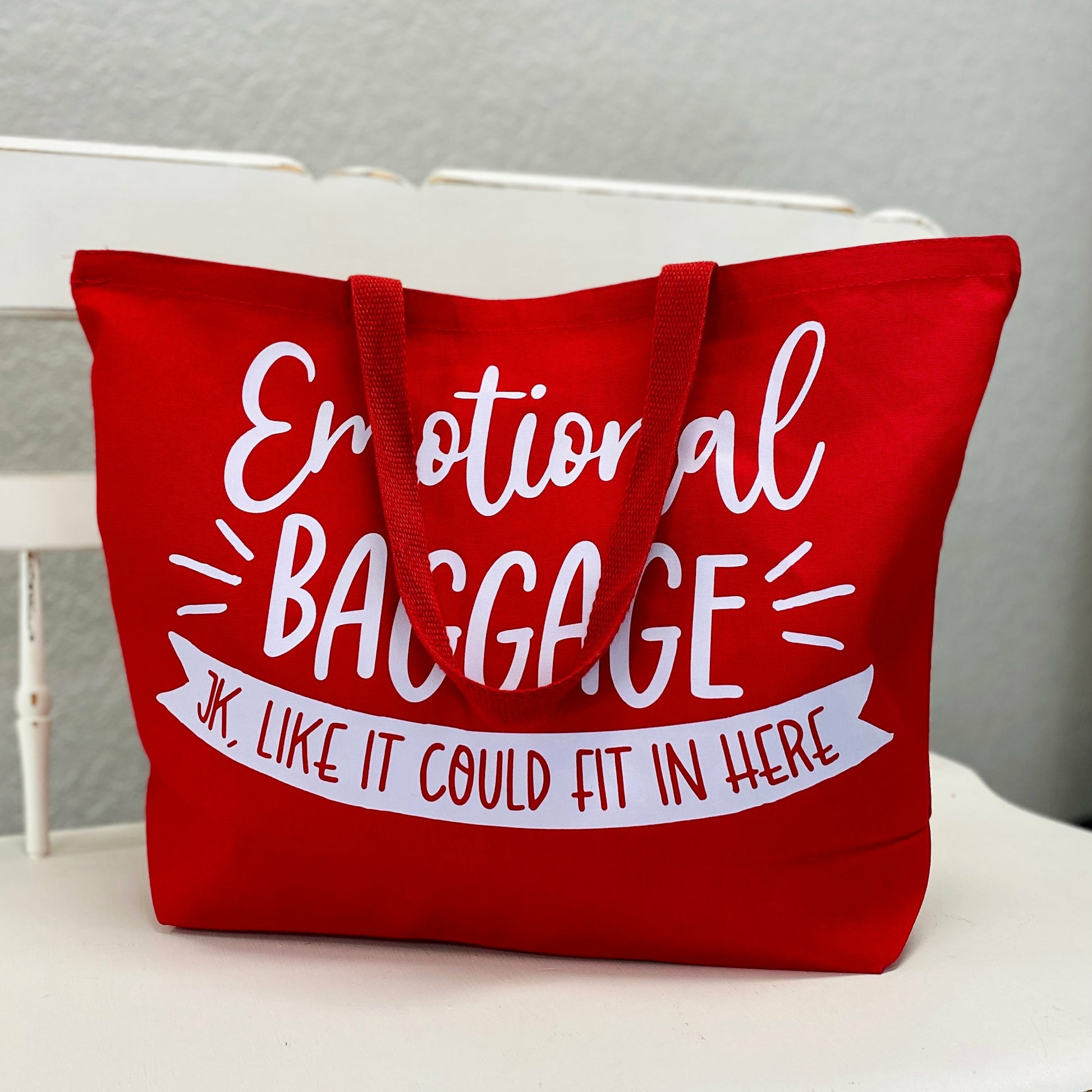 Emotional Baggage Red Bag  We all feel a little low sometimes, thankfully we've got a bag to carry snacks AND our sadness!   %100 cotton  Tea Shirt Shoppe 417-262-8828
