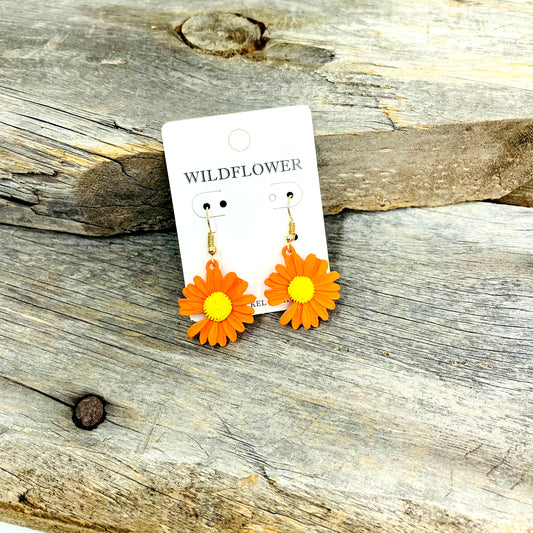 ﻿                                              Orange Flower Earrings  The Perfect Flare to add to your spring outfit.  Lead And Nickel compliant Flower  Dangle Orange  Tea Shirt Shoppe 417-262-8828